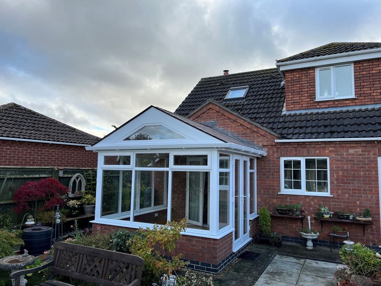 Conservatory fitted with an insulated tiled warm roof